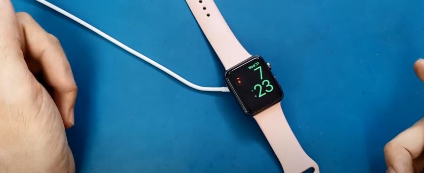 Why Apple watch not charging and show red lightning bolt?