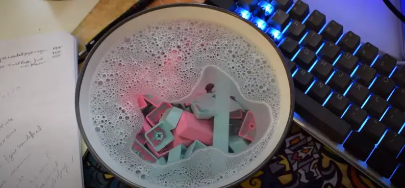 Soak Keycaps in a bowl with warm water 5 to 6 hours
